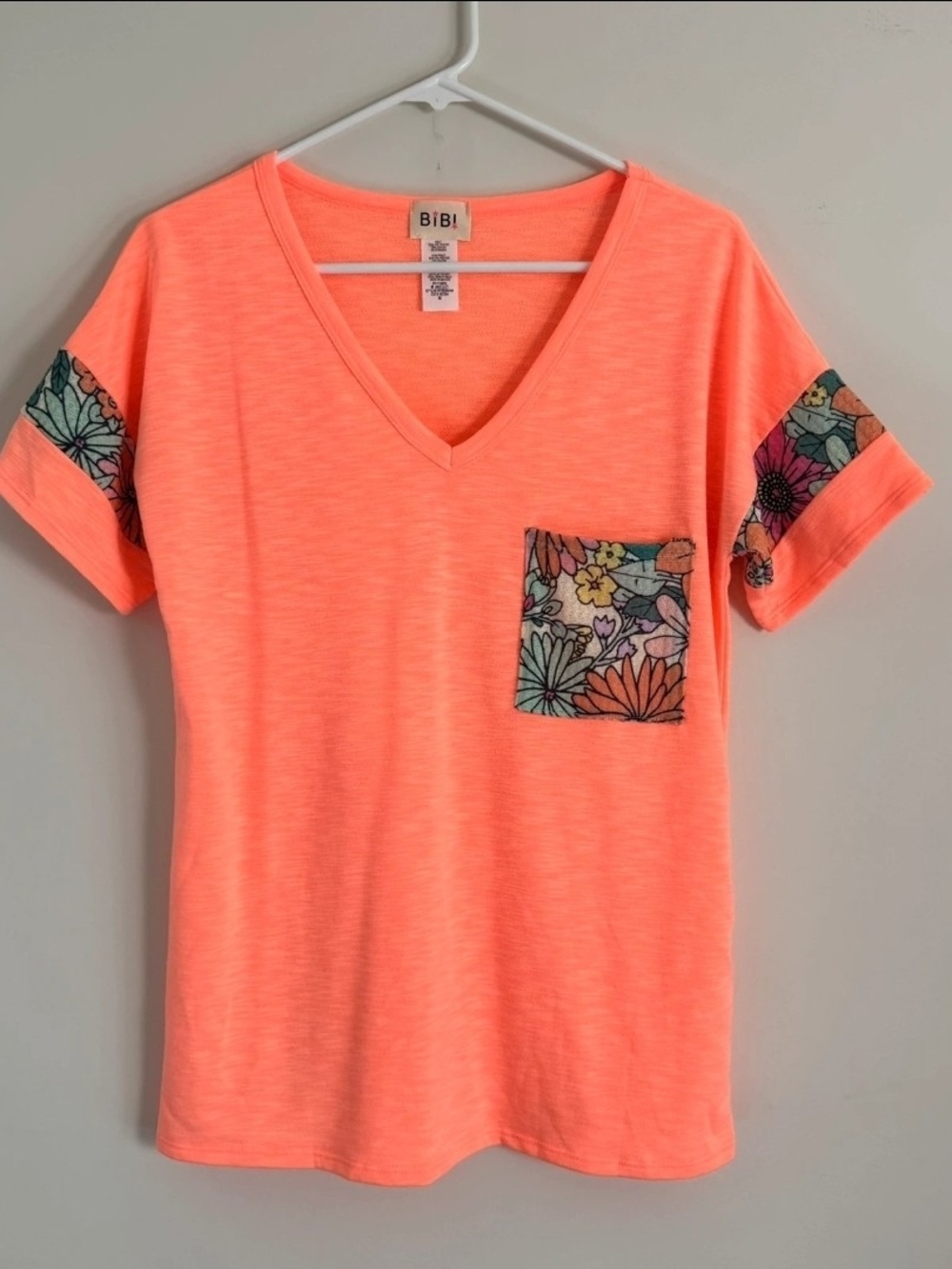 BiBi Neon Coral V-Neck Tee with Floral Pocket & Sleeve Trim